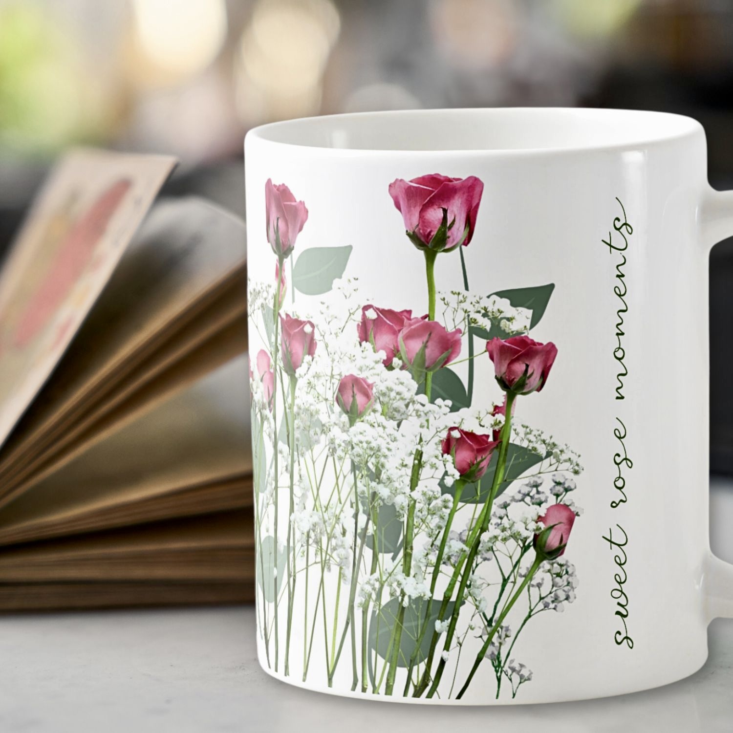Pink roses mug with mint green stems on white background, with an inspirational quote. Romantic design.
