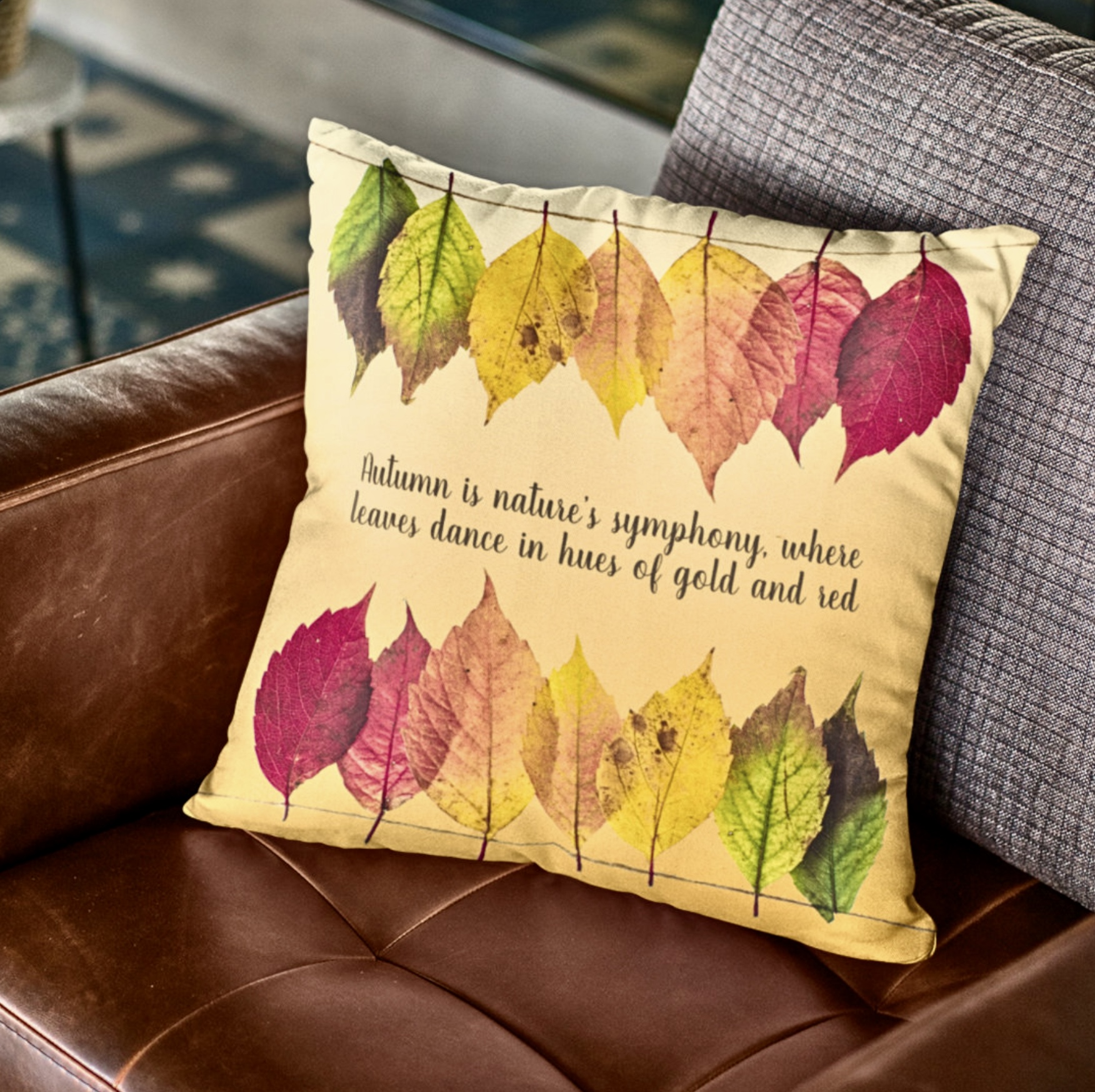 Fall dry leafs in red and yellow with a message on a sofa.