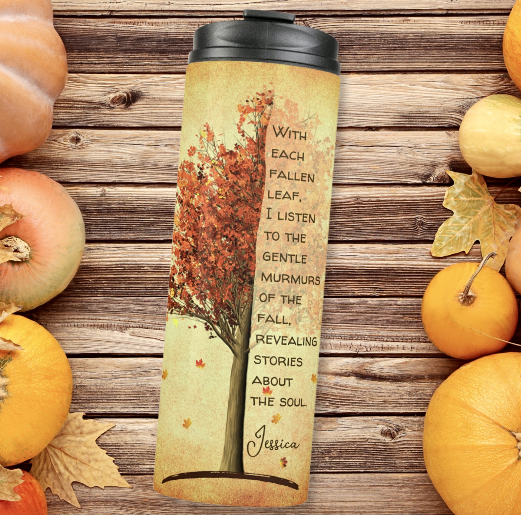 Yellow thermal tumbler with red maple tree and inspirational quote.