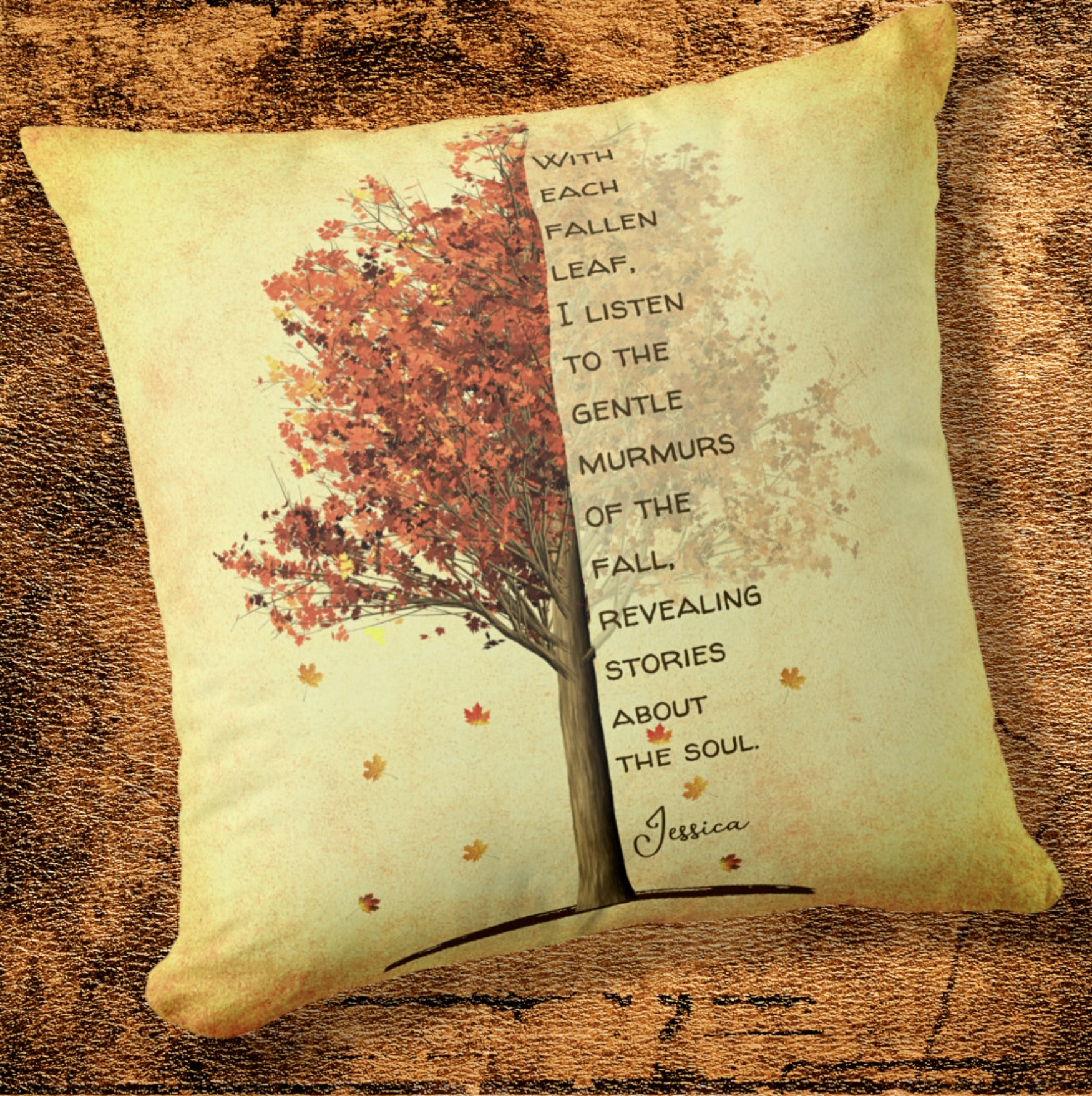 Yellow throw pillow with a red maple tree image and an inspirational quote.