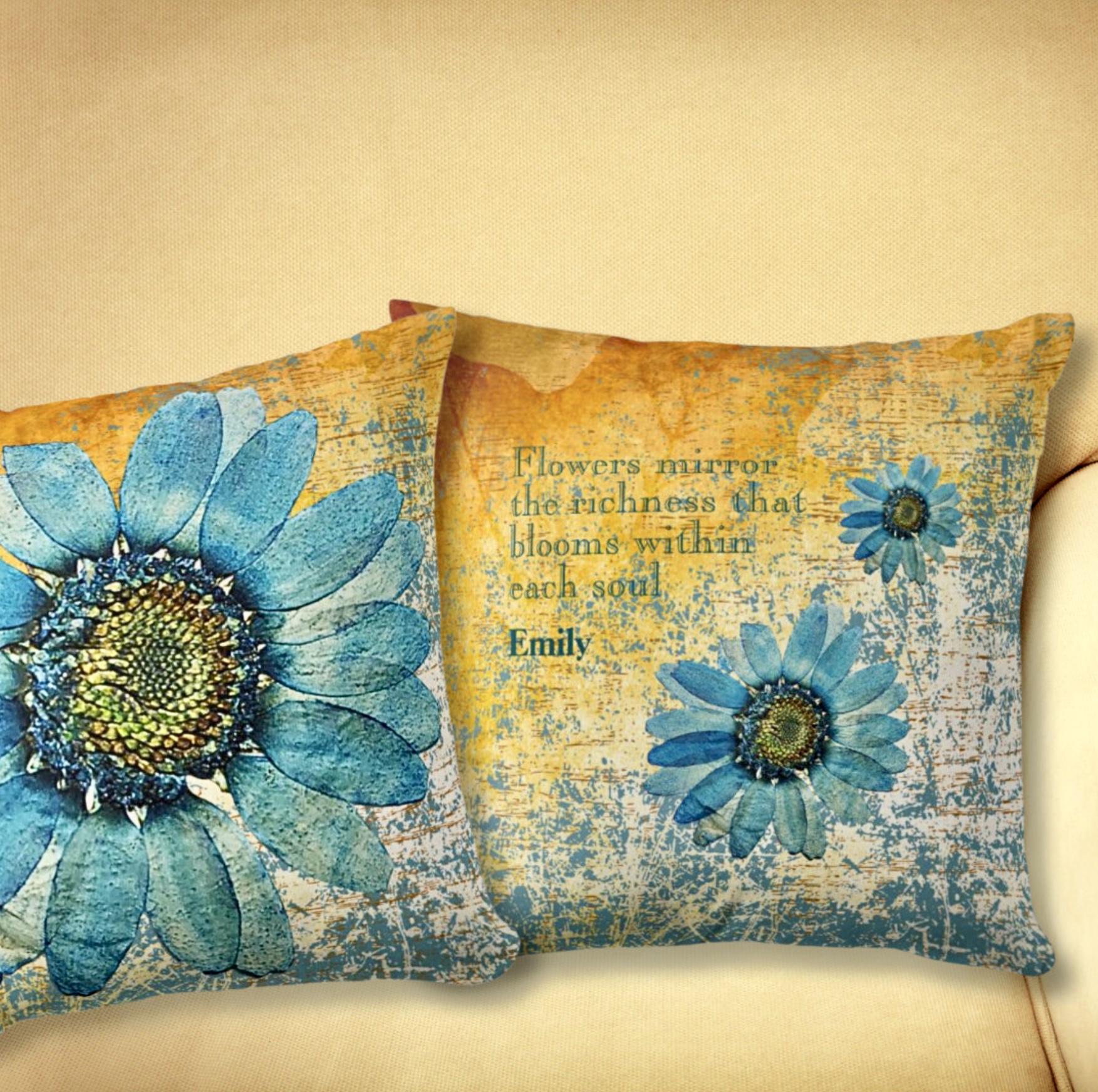 Two double sided blue flowers pillows with inspirational quote.