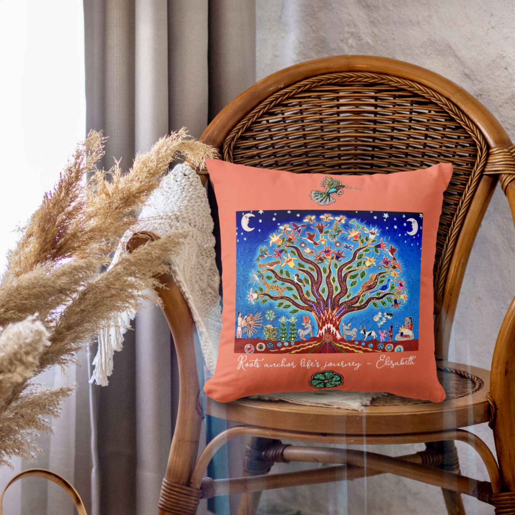 Vibrant peach throw pillow with a Tree of Life on the center, against a blue night sky. Includes an inspirational quote.