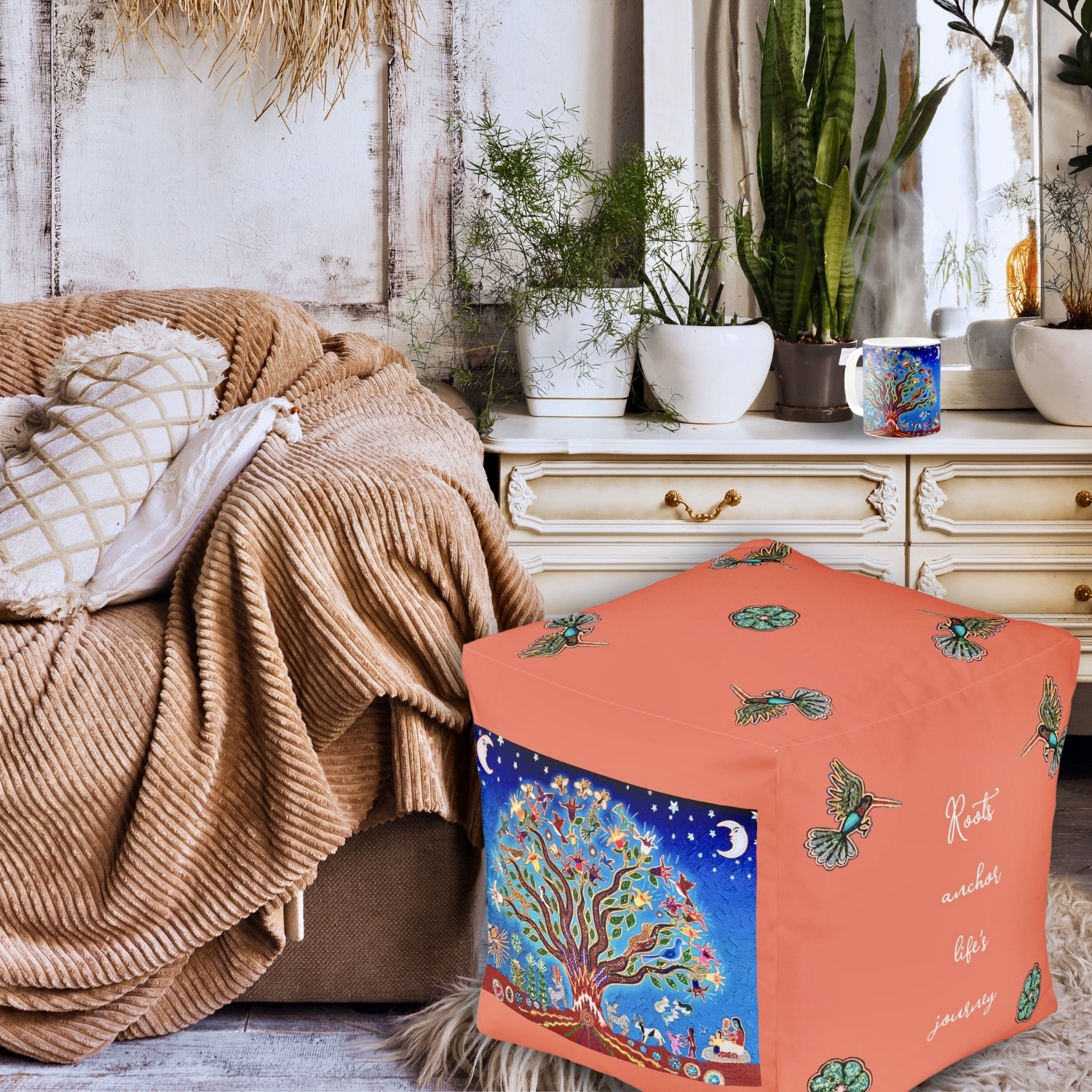 An ottoman pouf featuring the Night Sky Tree of Life design. The pouf is adorned with a vivid depiction of a majestic tree with swirling branches against a dark blue background dotted with stars. The design creates a sense of tranquility and elegance, adding a touch of artistic beauty to any living space.