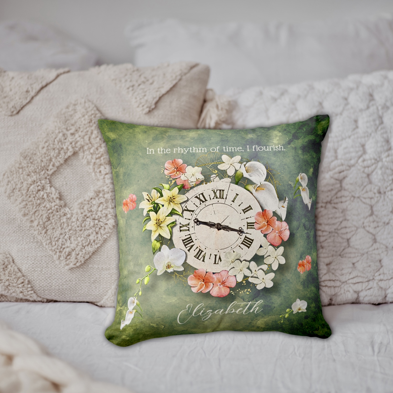 Moss green throw pillow with Victorian clock at the center and soft white, yellow and peach color flowers. Includes an inspirational message and space for name personalization.