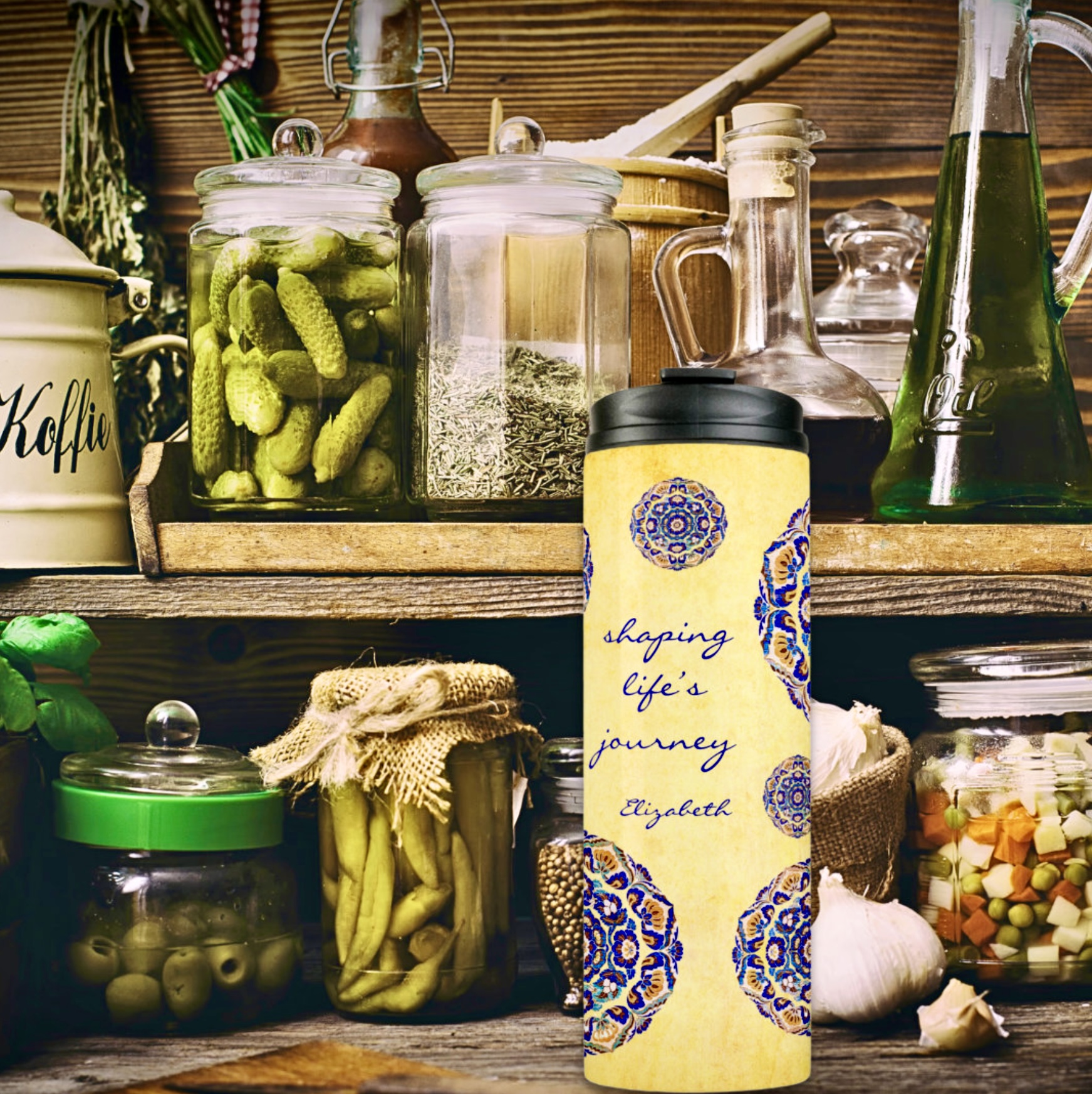 Yellow thermal tumbler with blue flowers medallions and inspirational message with name space for personalization.