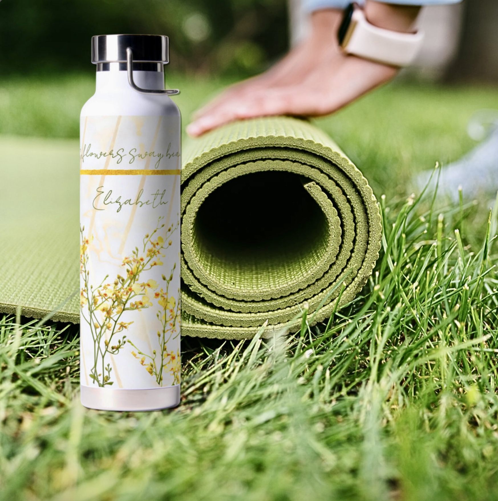 White bottle waters with yellow wildflowers and diagonal golden ribbons. It also shows an inspirational message, and personalization space for name.