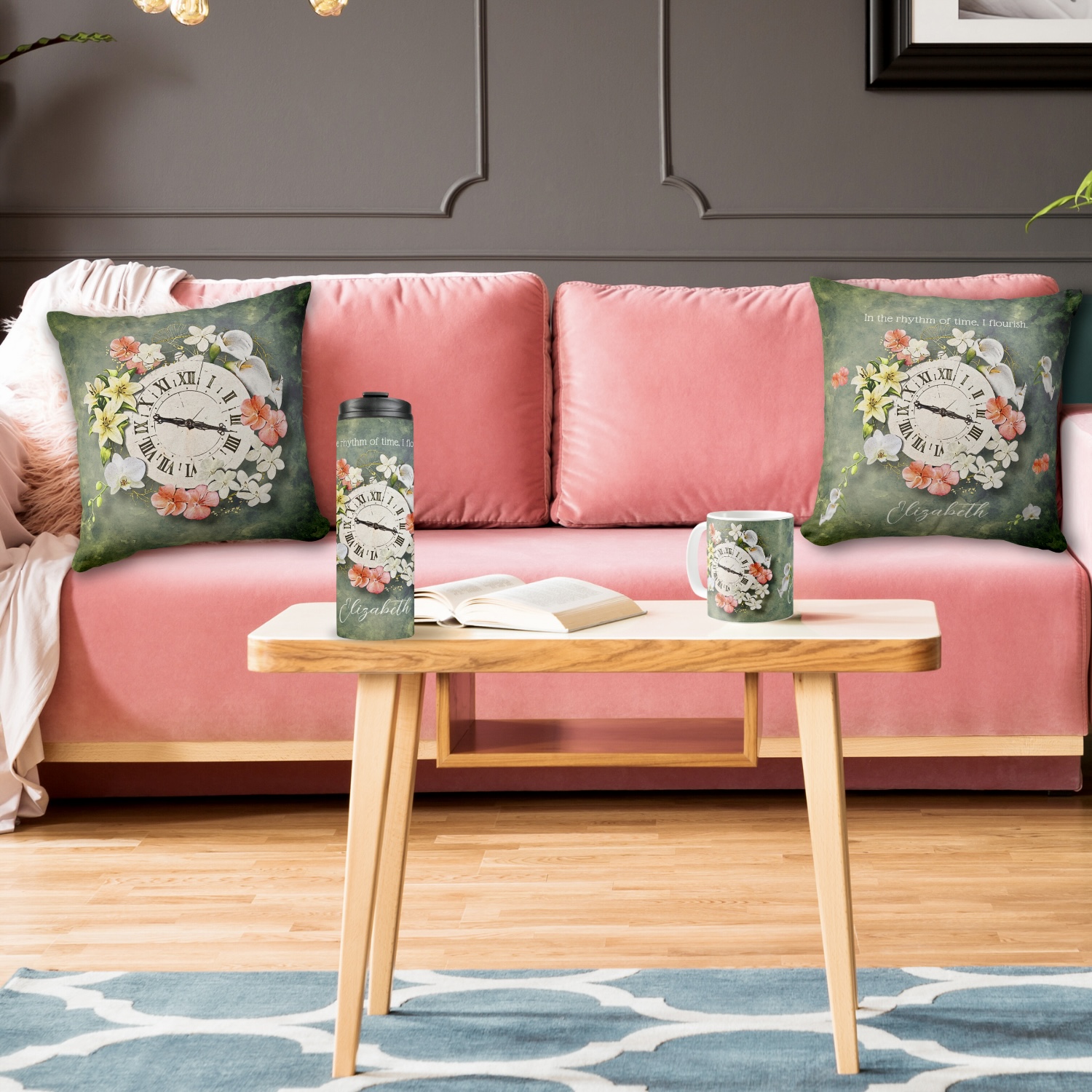Pink living room sofa with two moss green vintage clock pillows, and a mug and tumbler set with same design.
