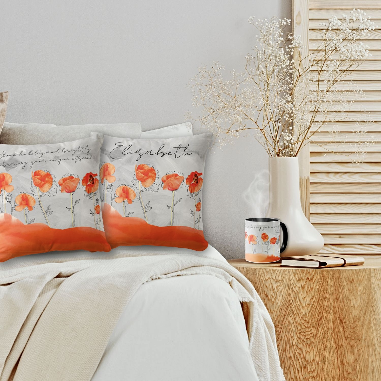 A throw pillow and mug featuring vibrant orange poppies on a gray background. Personalized with name.