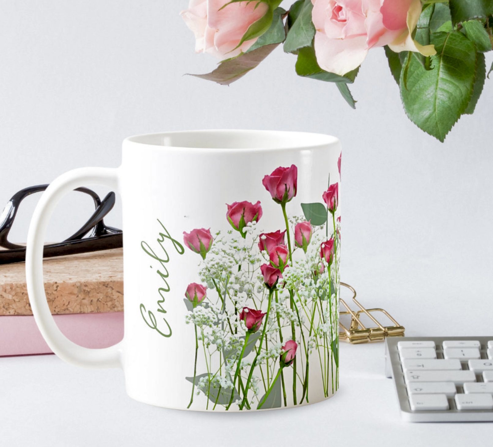 Matching mug with pink roses and small white flowers with inspirational message.