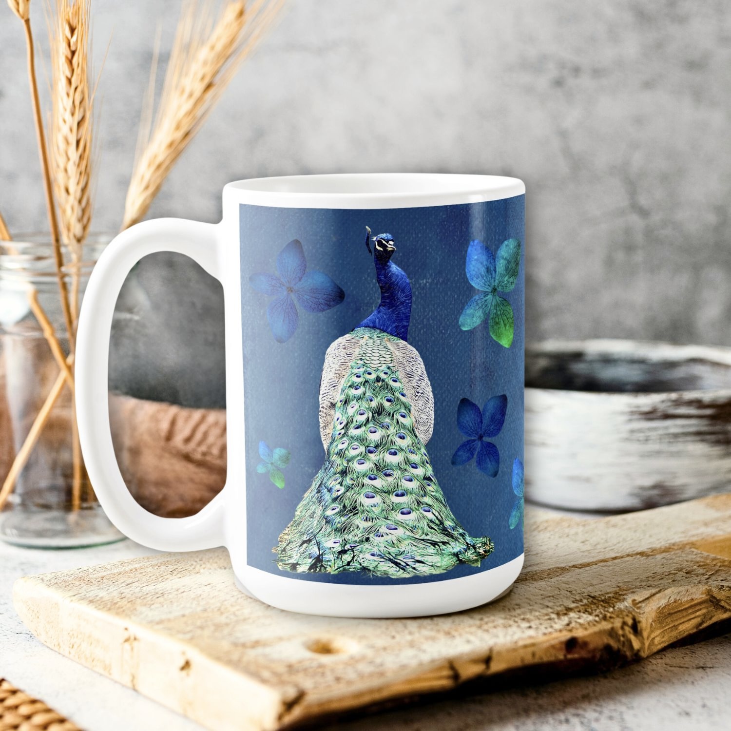 Cobalt blue mug with blue peacock and blue green flowers. Vintage style.