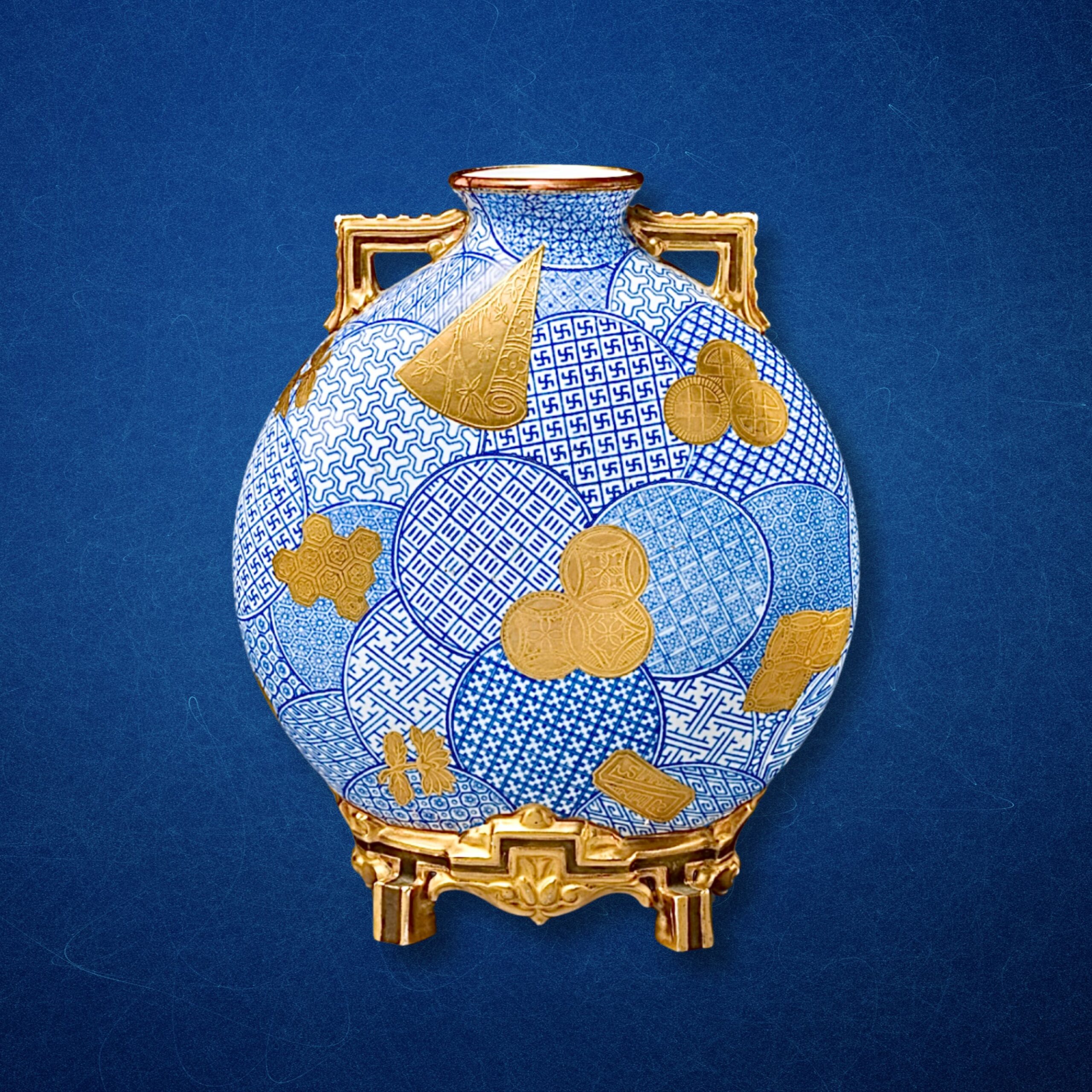 Blue and golden moon flask inspired by Japanese artistry, reminiscent of designs from 1878.