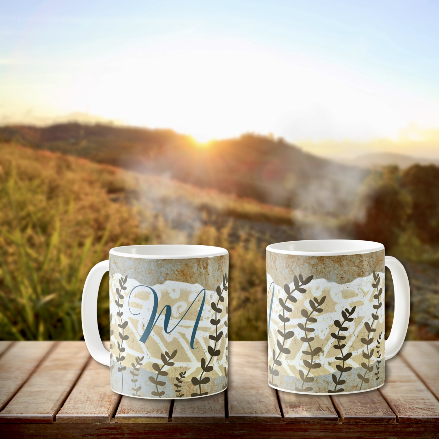 A monogrammed coffee mug with a boho-style design, featuring intricate patterns and personalized initials.