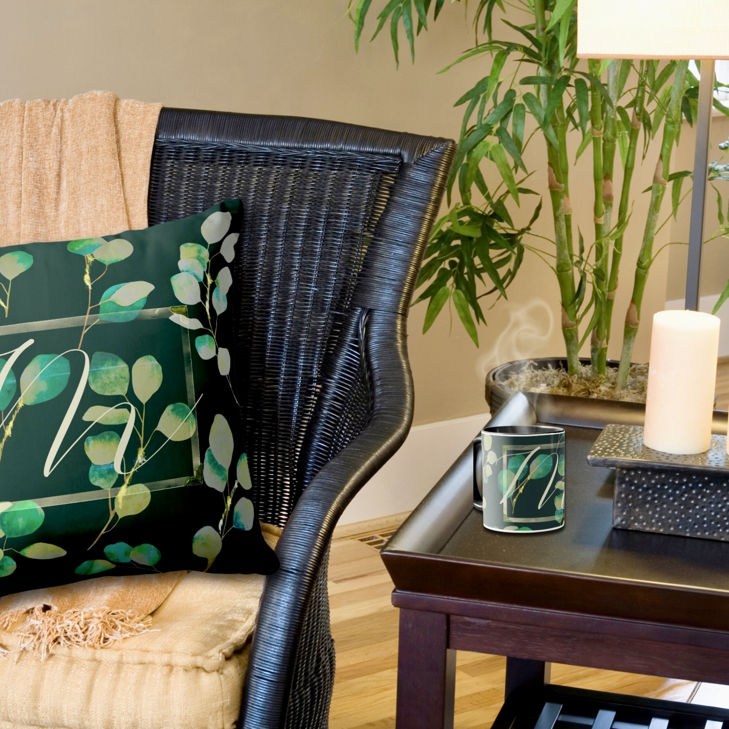 A moody green monogrammed pillow and mug, featuring personalized initials and rich, dark green hues.