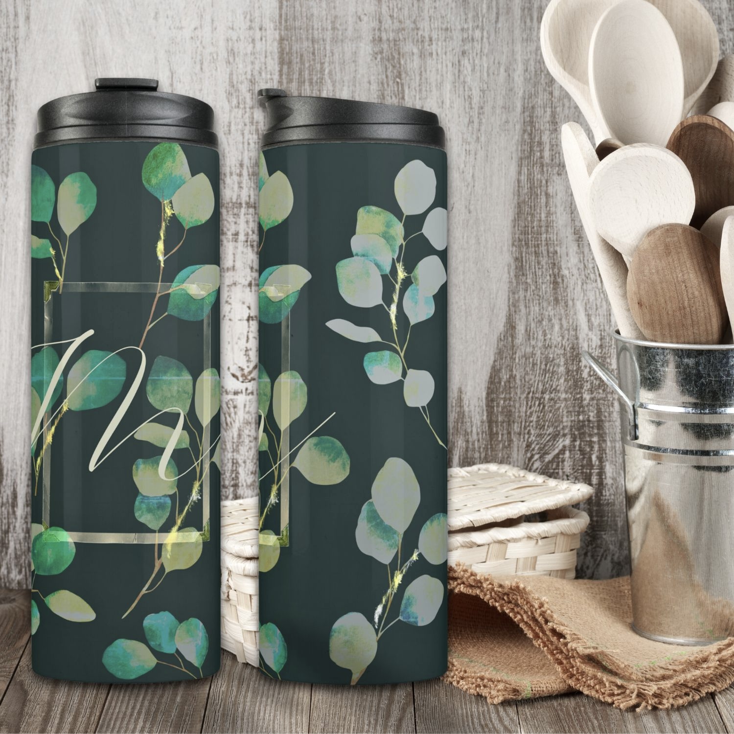 A personalized moody green thermal tumbler featuring a sleek design and customizable inscription.