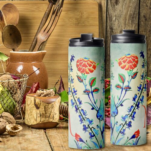 **ALT text:** Antique Flowers Ottoman Dynasty painting thermal tumbler featuring a washed-out blue surface with vibrant floral designs inspired by a late sixteenth-century Istanbul tankard. The tumbler showcases elegant tulips, hyacinths, and carnations against a dreamy, sunset-like backdrop. Personalization options are available for adding a name initial, combining vintage beauty with bohemian charm for a unique and meaningful gift.