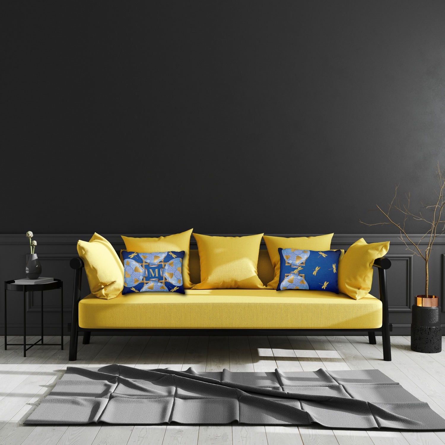 Unique luxury blue and gold accent pillow, showing front and back views, elegantly placed on a striking yellow-golden sofa.