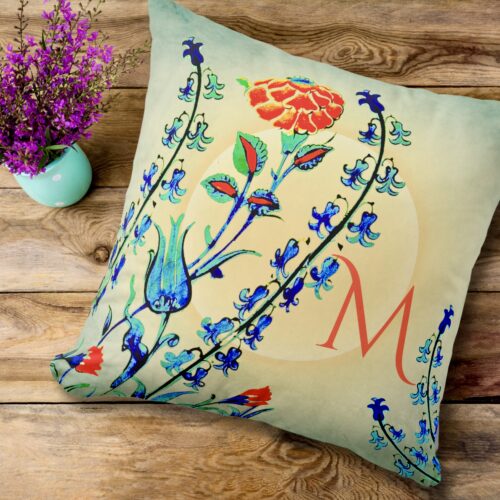 Vintage floral throw pillow inspired by Ottoman Dynasty artistry, featuring blue and orange tones, set against a sunset backdrop with space for initials. Pillow with matching mug.