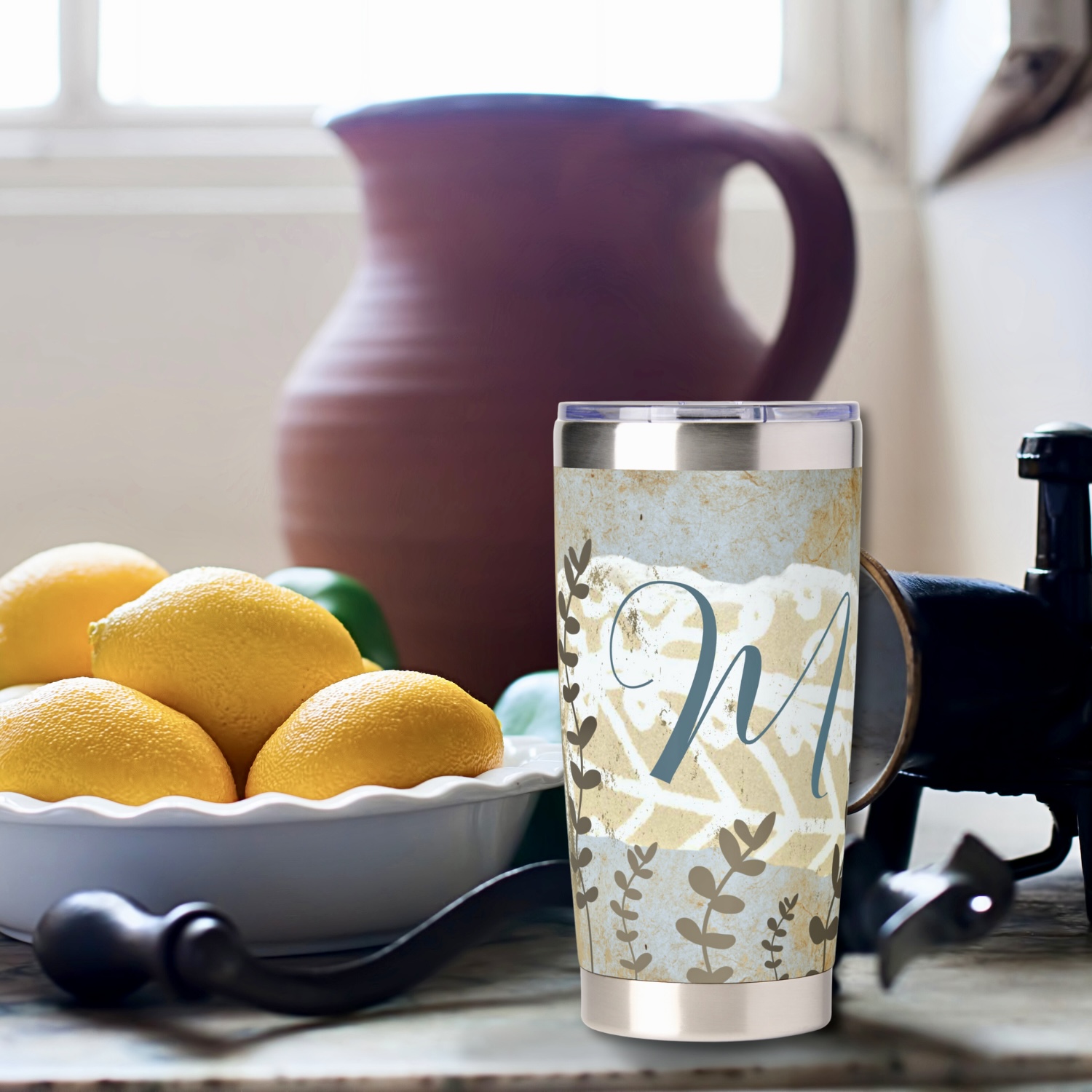 Monogrammed boho thermal tumbler with earthy blue and brown colors. 