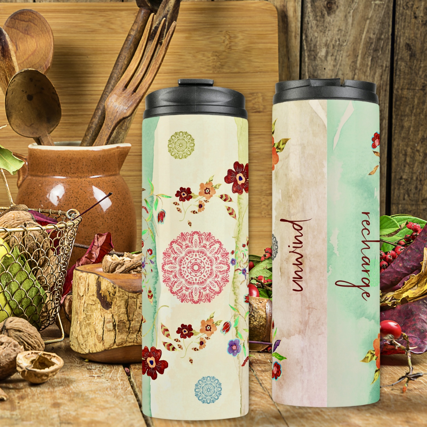Tranquil tumbler featuring intricate watercolor flower designs and a coral-toned mandala, evoking elegance and tranquility.