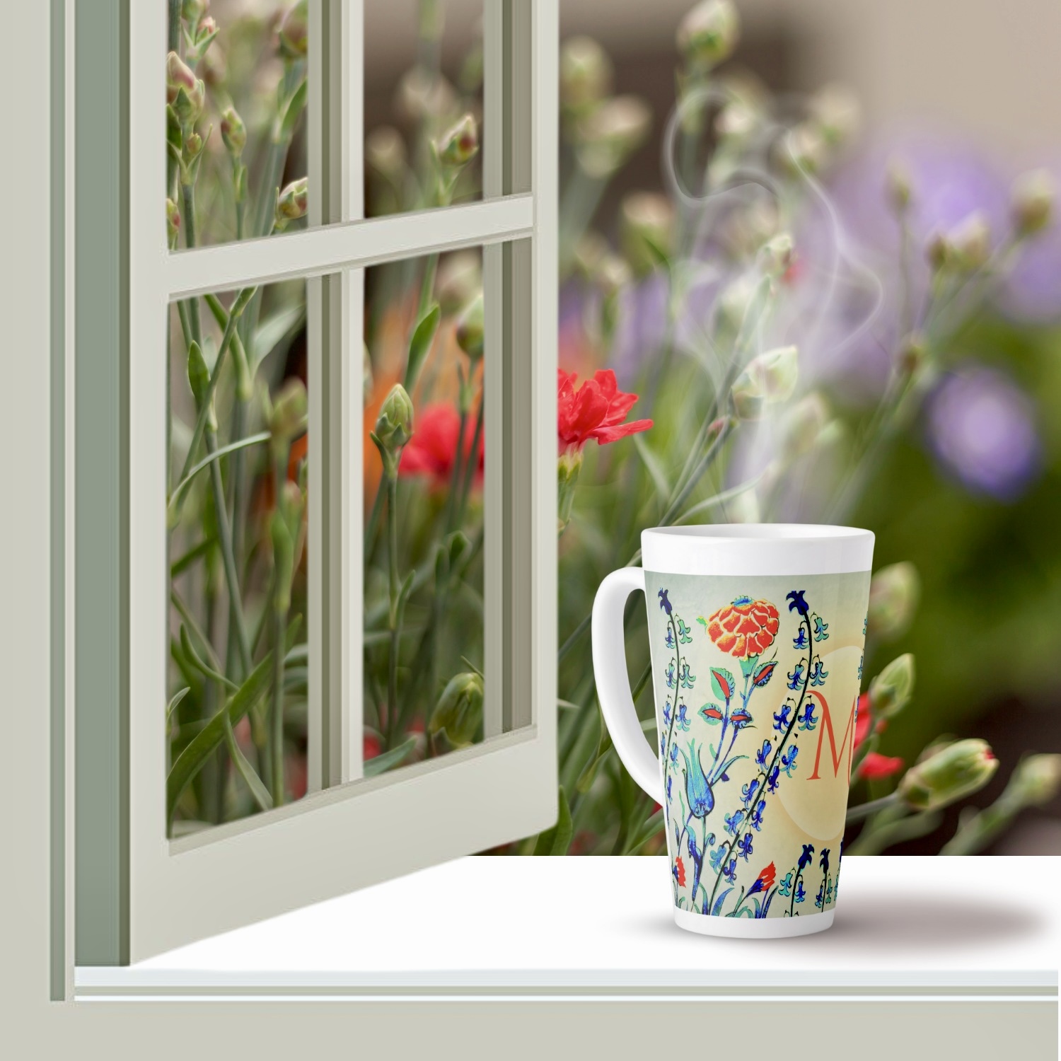 An Antique Floral Monogram Latte Mug featuring delicate floral patterns in shades of blue, green, and red, offering vintage charm and elegance to any beverage experience.