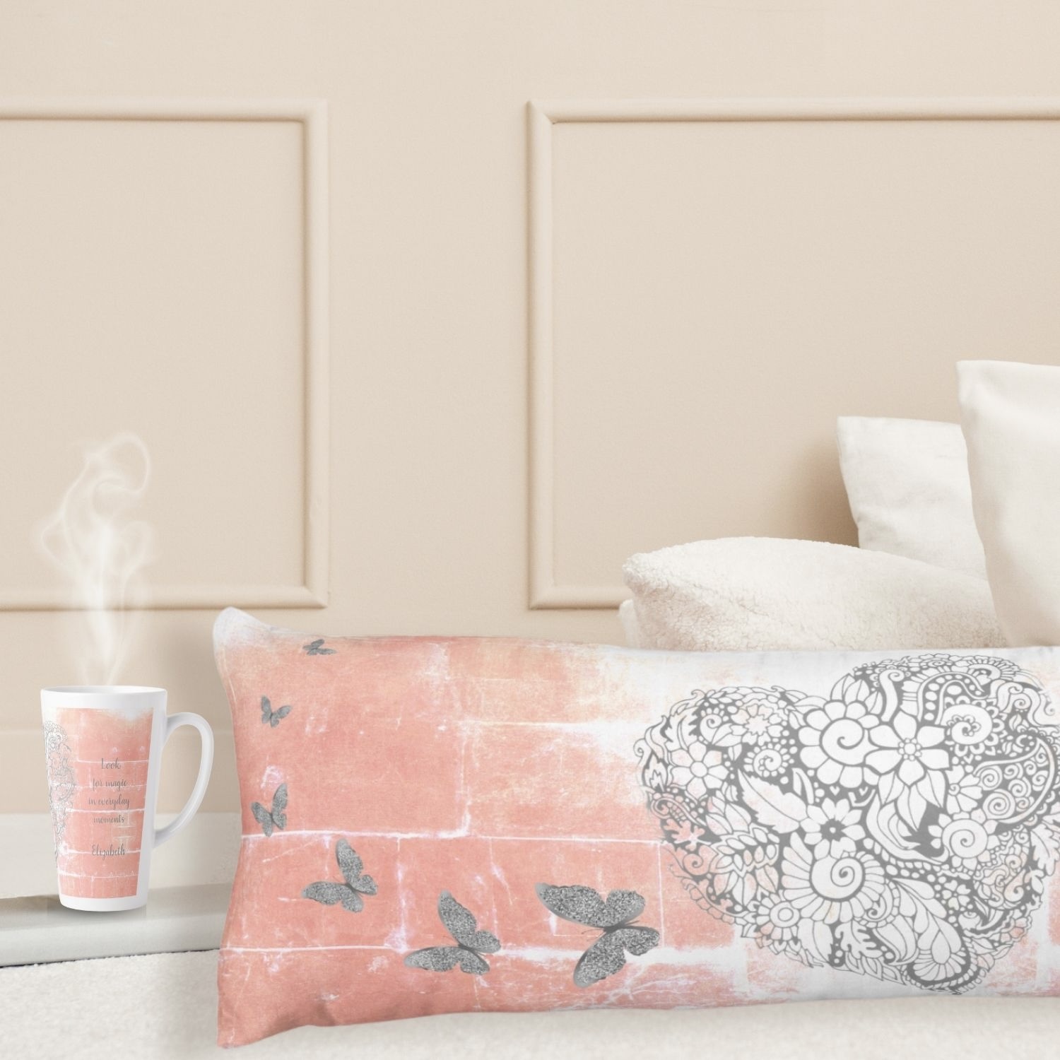 Rustic peach body pillow and latte mug with inspiring silver hearts, enhancing comfort and style in a serene bedroom setting.