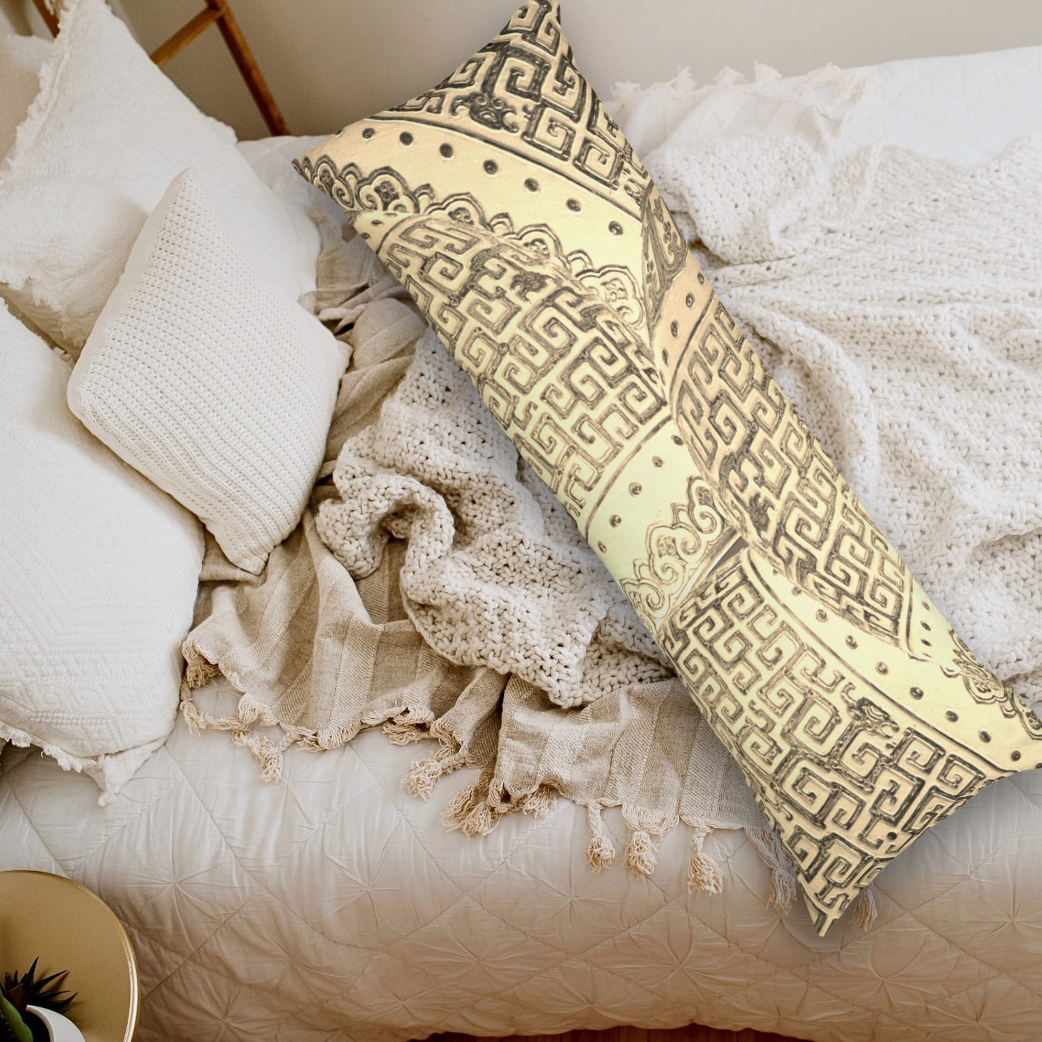 The back of this pillow showcases the same intricate design, rendered in sepia and golden brown tones, on a cozy neutral-colored bed. The vintage-inspired patterns add a touch of elegance and charm to the serene bedroom setting.