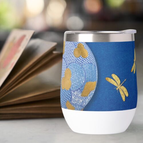 **ALT text:** Golden and blue vintage Japanese thermal wine tumbler with a central moon flask design and four dragonflies at each corner. This piece combines art and elegance, inspired by Japanese artistry and a moon flask created in 1878 by the Worcester factory, celebrating the timeless allure, authenticity, and uniqueness of the Orient.