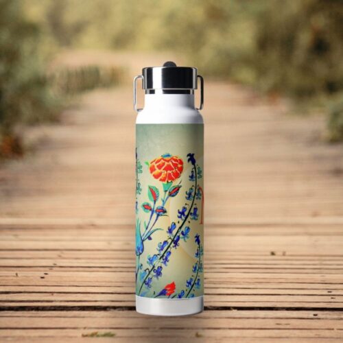 Antique Flowers Ottoman Dynasty painting water bottle featuring a washed-out blue surface with vibrant floral designs inspired by a late sixteenth-century Istanbul tankard. The elegant design showcases tulips, hyacinths, and carnations against a dreamy, sunset-like background. This water bottle offers personalization options for adding a name initial, combining vintage beauty with bohemian charm for a unique and thoughtful gift.