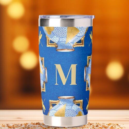 Golden and blue vintage Japanese-style insulated tumbler featuring a central moon flask design with four dragonflies at each corner. The elegant blue and gold artwork is inspired by Japanese artistry and a 1878 moon flask created by the Worcester factory, celebrating the timeless allure and authenticity of the Orient.