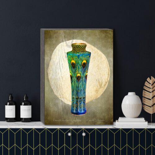 It’s a vase with lush peacock feathers against a neutral background. Inspired by Japanese artist Kawade Shibataro, the vivid green and blue feathers create movement and vibrancy. The rustic wooden adds elegance, making it a perfect stand-alone piece for any space. It’s a public domain print on a wooden box.  